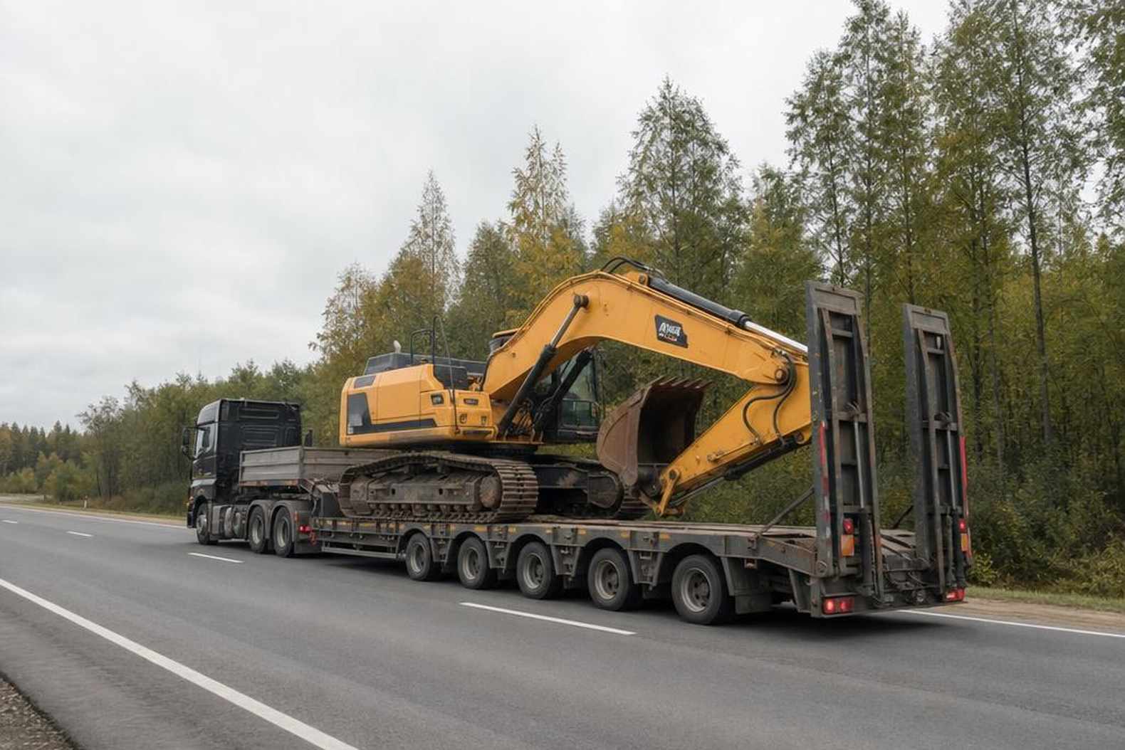 перевозка гусеничного экскаватора на трале по трассе
